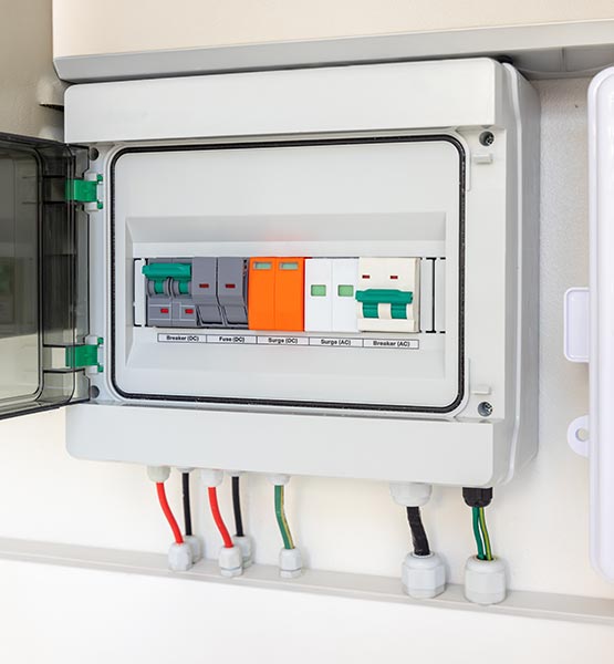 Modern electrical distribution box with surge protection devices.