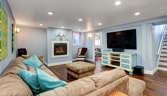 Living room with installed ceiling lighting.