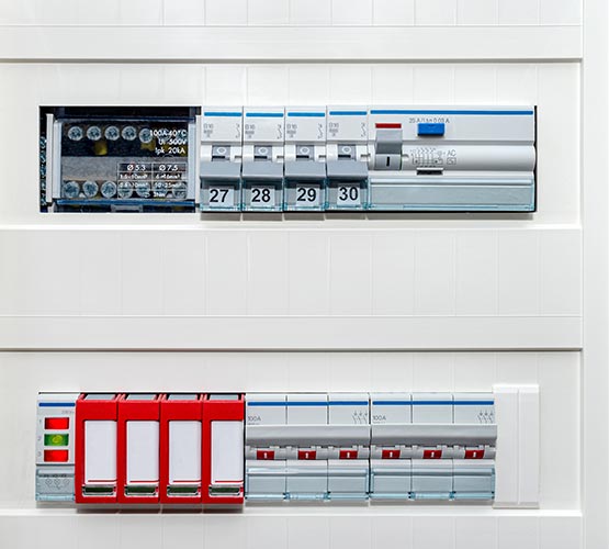 Modern residential electrical panel with circuit breakers.