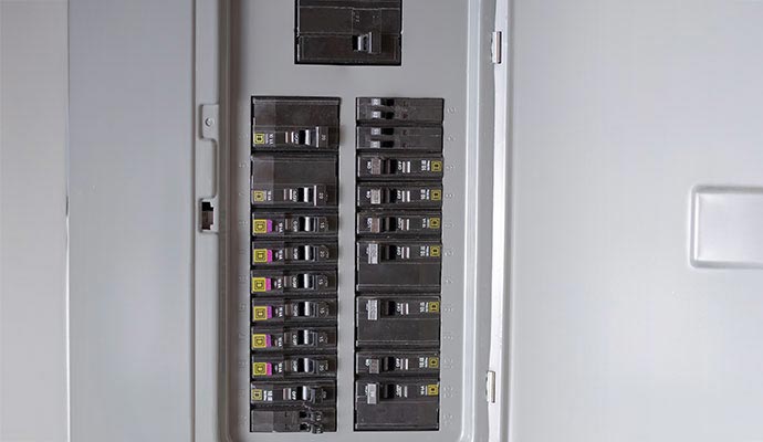 A wall mounted breaker panel.