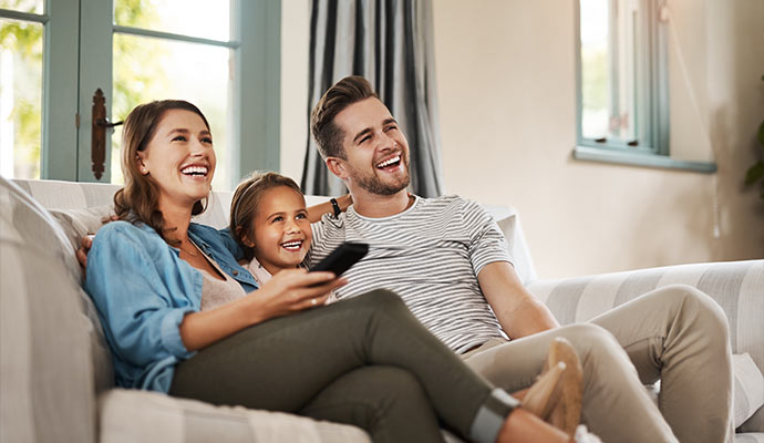Happy family enjoying indoor comfort.