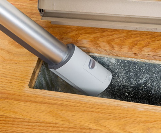 Professional air vent cleaning with equipment