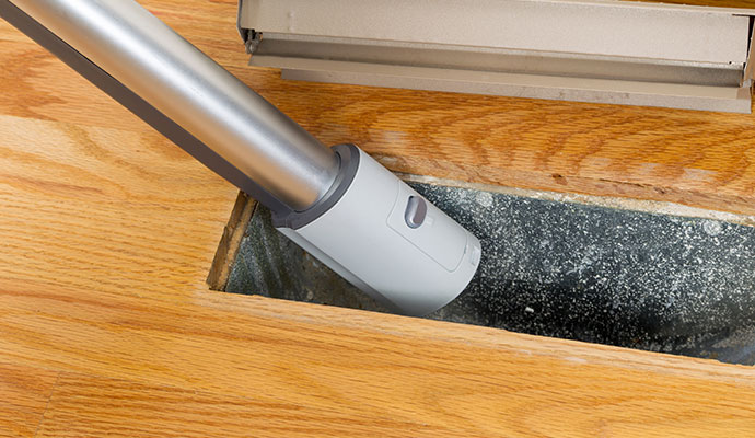 Professional air vent cleaning with equipment