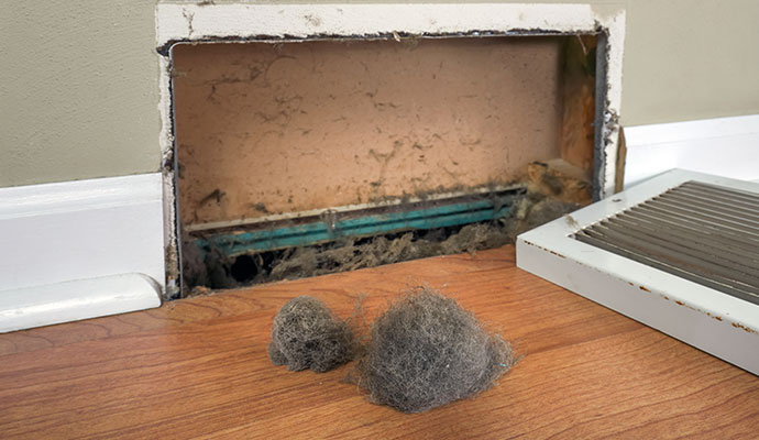 Duct vent with dust and debris