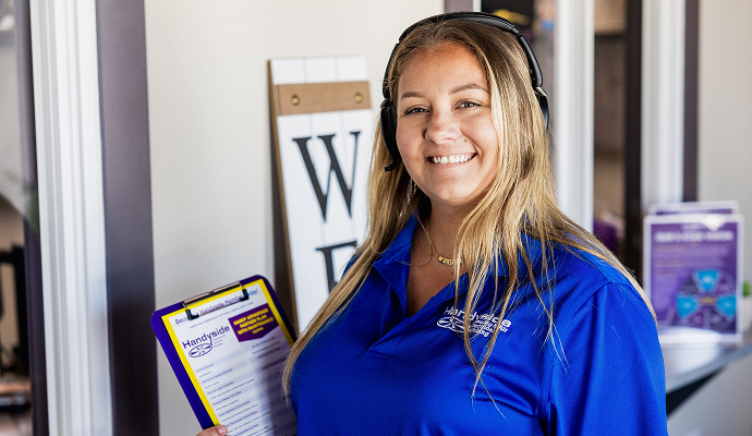 Handyside service technician with completed job card