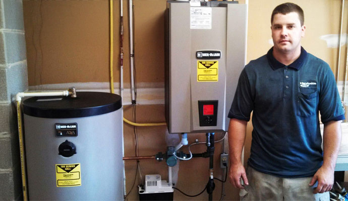 Technician standing with heating system