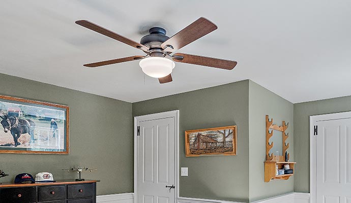 Modern ceiling fan in a cozy bedroom