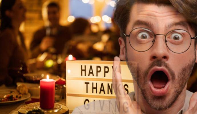 A surprised man celebrating a Happy Thanksgiving dinner.
