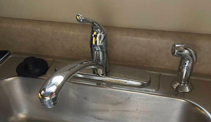 Faucet installed on a kitchen sink