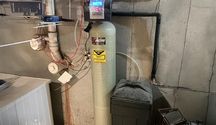 Water softener installation in a basement.